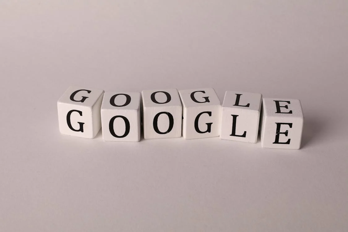 SEO Vs PPC comparison - image of letter blocks spelling "google"